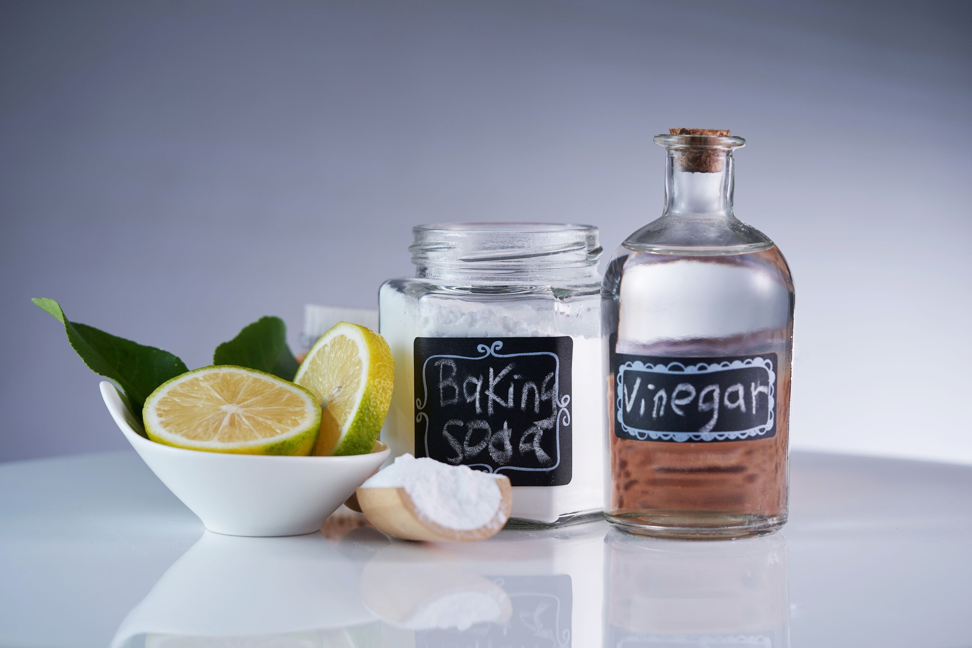 jar of  baking soda and white vinegar on  table top